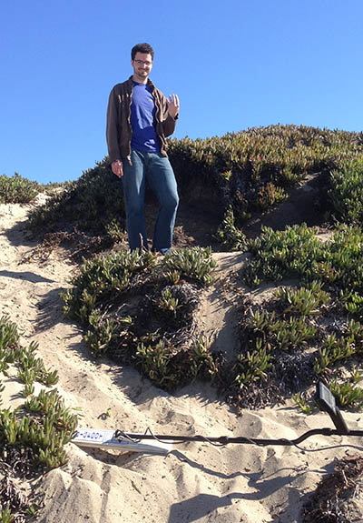 Although he lost his ring up where he is standing, near the top of the bluff, we found it about six feet down the bluff where my metal detector is lying.