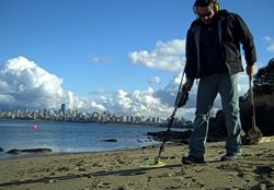 Chris Turner metal detecting at the beach Chris Turner