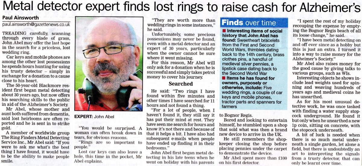 Metal detector expert finds lost rings to raise cash for Alzheimer's newspaper clipping