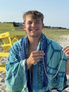 Edward Trapper NJ Ring Finder recovers Necklace on the beach in Manasquan New Jersey