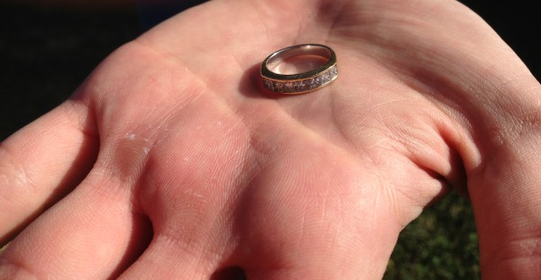 The ring was in knee high water unfortunately surrounded by bottle caps, pull tabs and other junk!