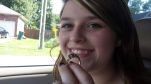 My Daughter holding the ring